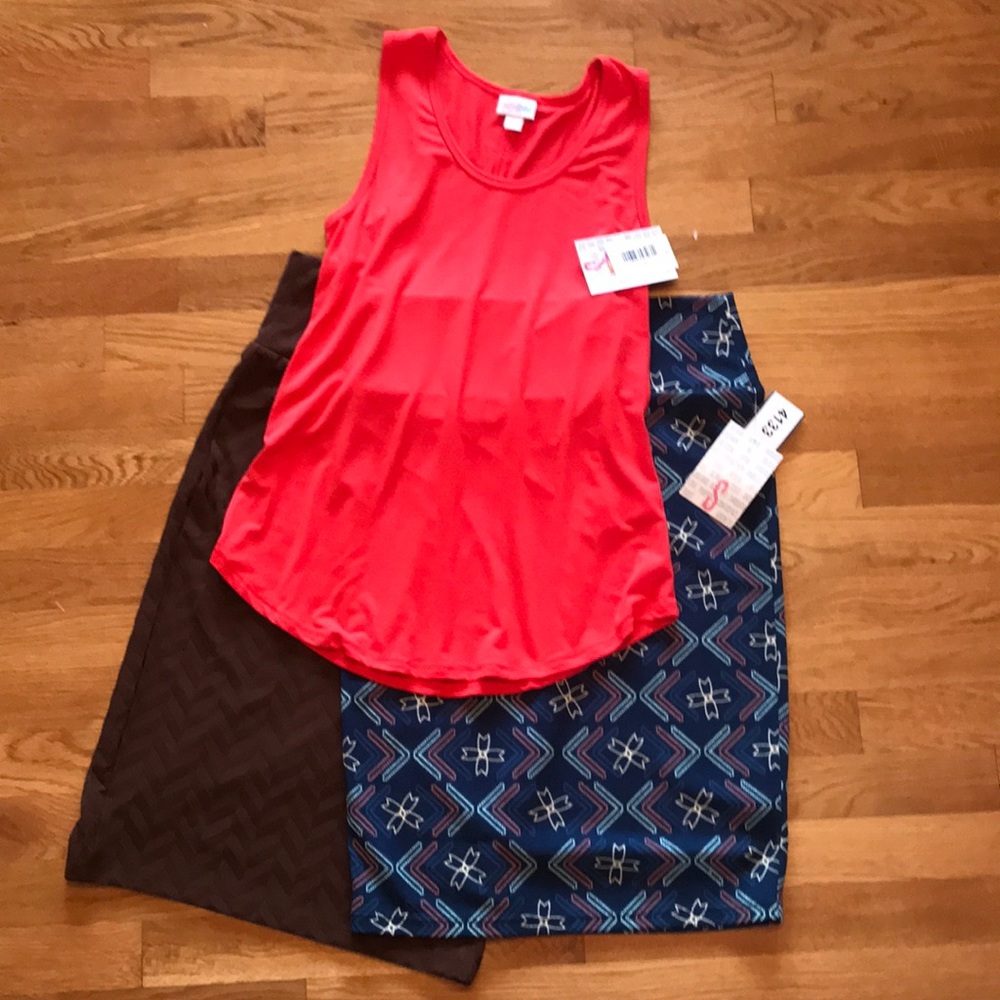 Lularoe Cassie skirts and tank top.